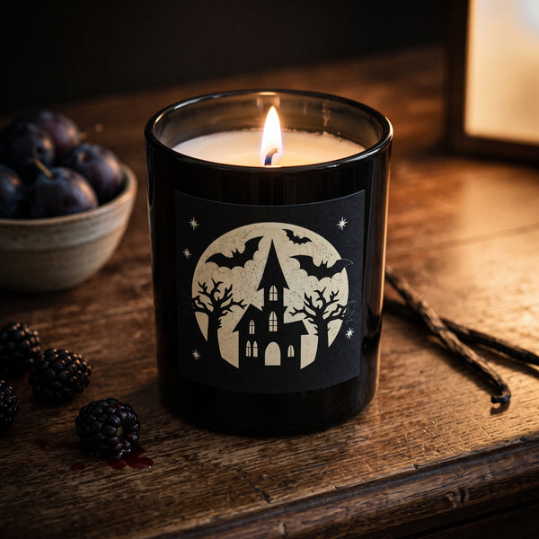 Witching Hour Candle burning on an old walnut sideboard at night | Noteology